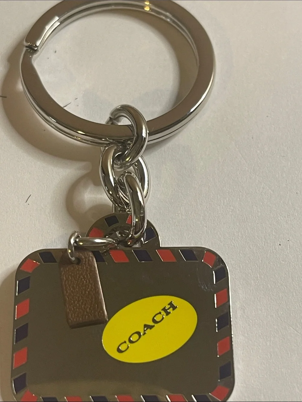 COACH Silver Bag Keychain and Coach Pen